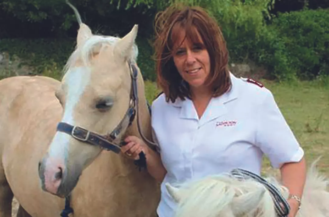 Major Vivienne Prescott with horses