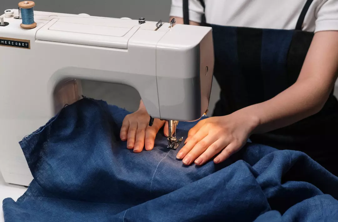 Someone using a sewing machine