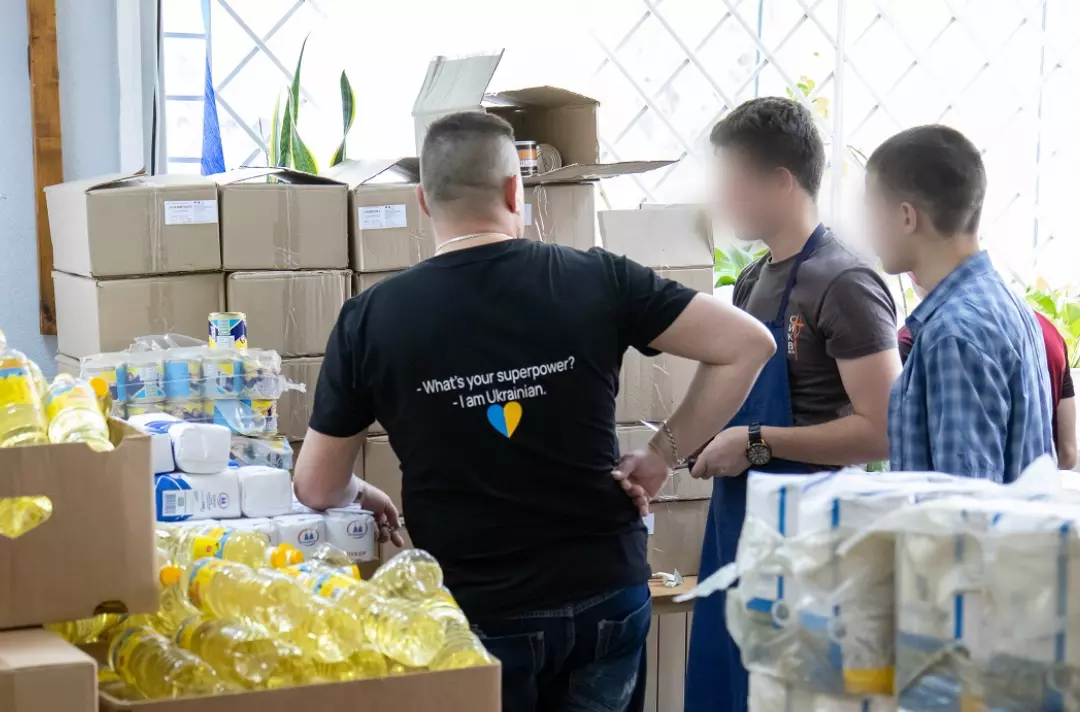 Volunteers in Ukraine sort donations of food