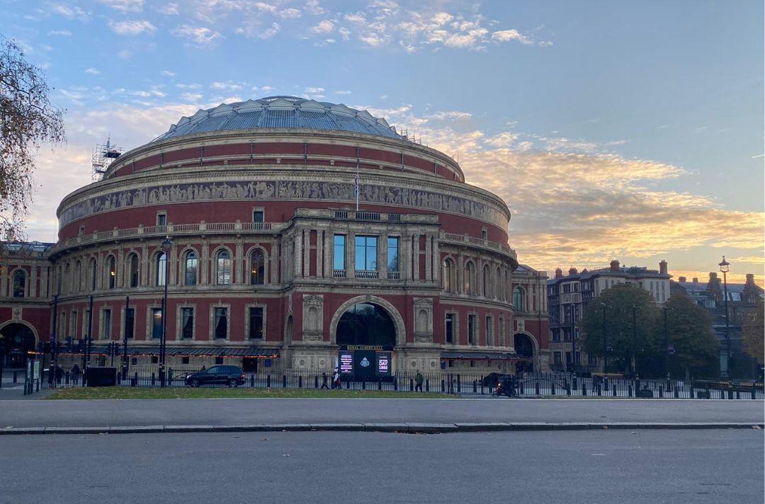 A photo of the Royal Albert Hall as the sun is setting