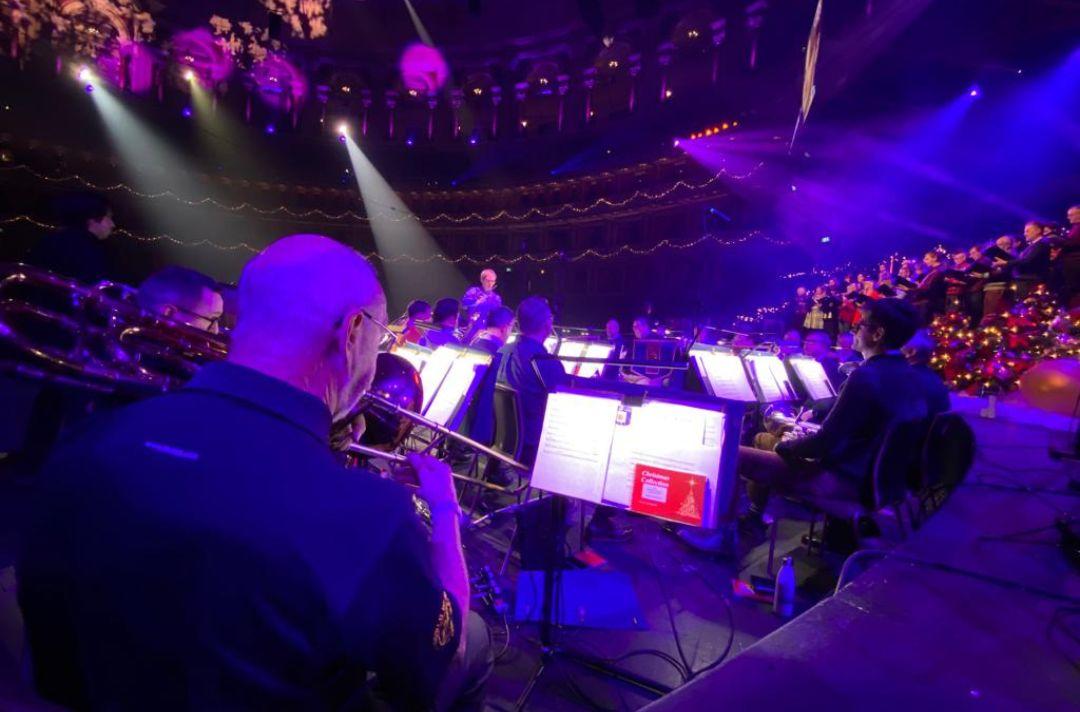 A photo of The International Staff Band and Songsters rehearsing at the Royal Albert Hall