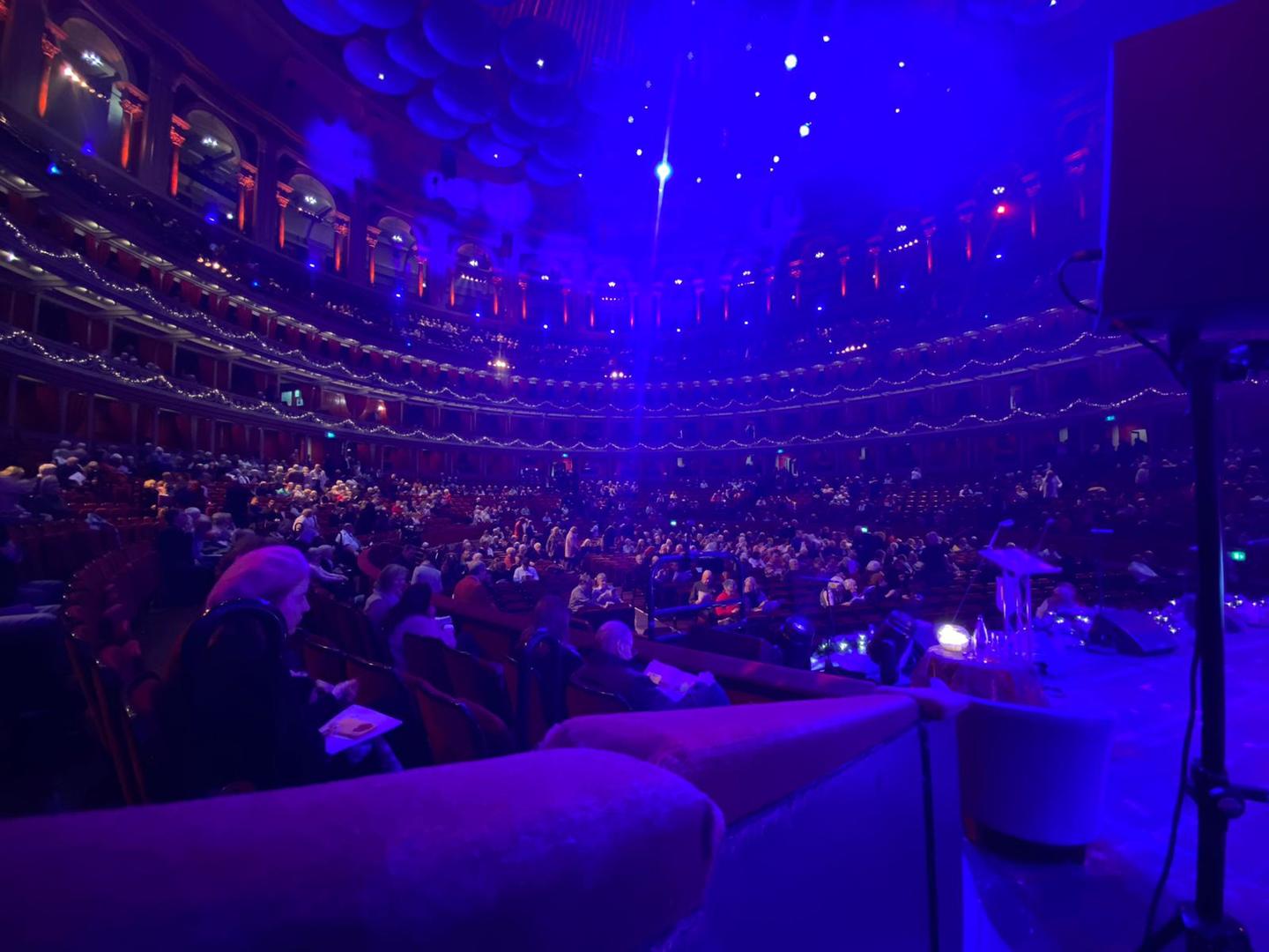 A photo of the audience taking their seats in the Royal Albert Hall 