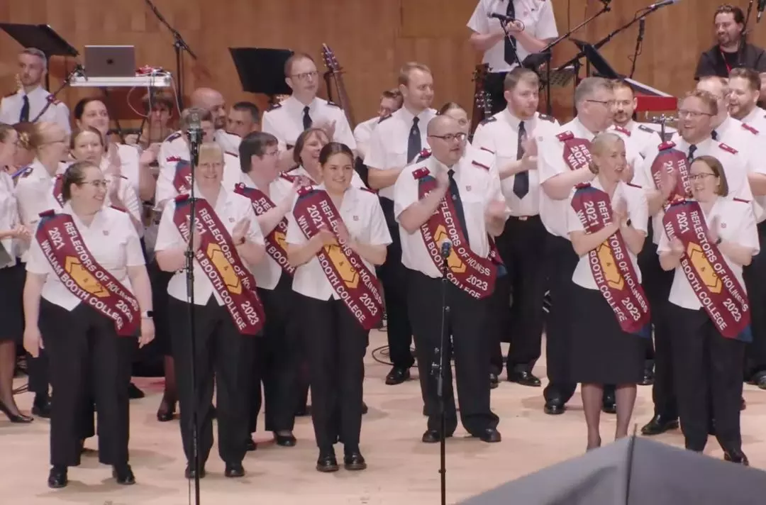 A photo of the new lieutenants wearing their sessional sashes