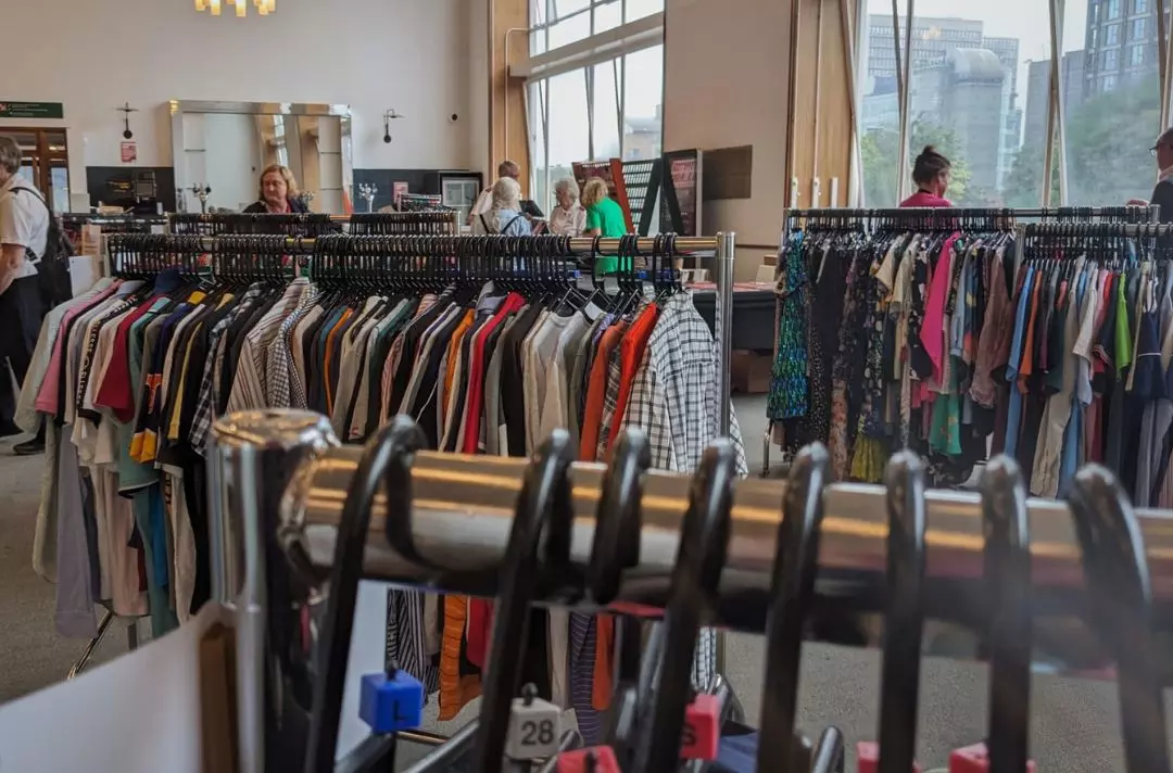 A photo of clothes on rails