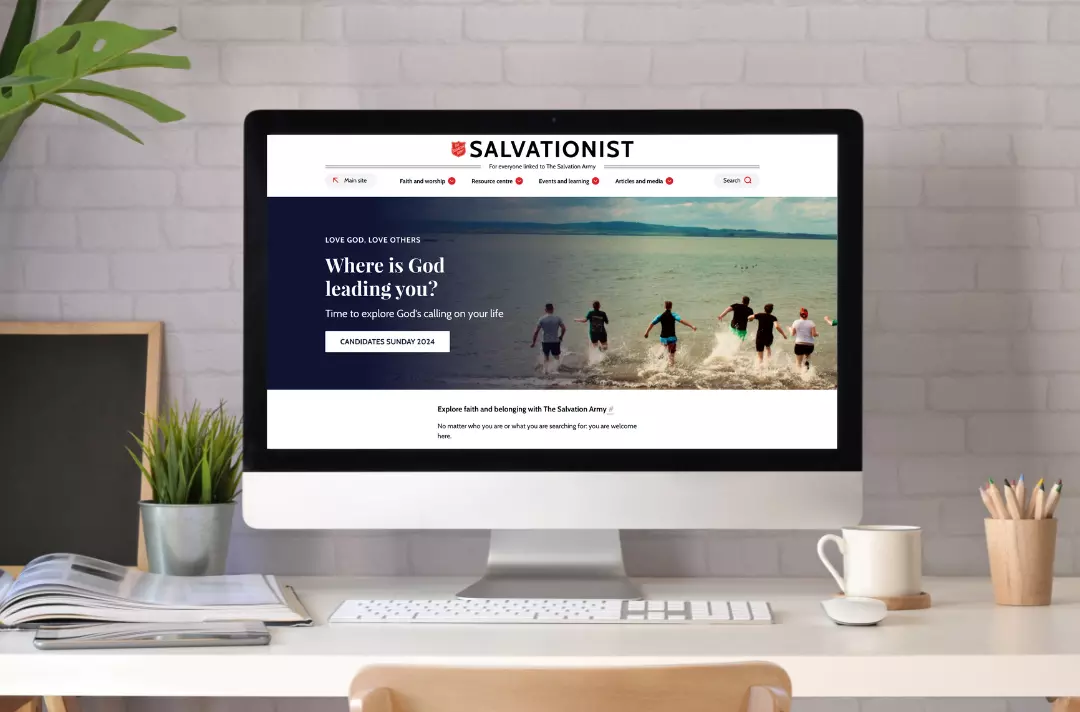 A photo of a computer displaying the Salvationist webpage