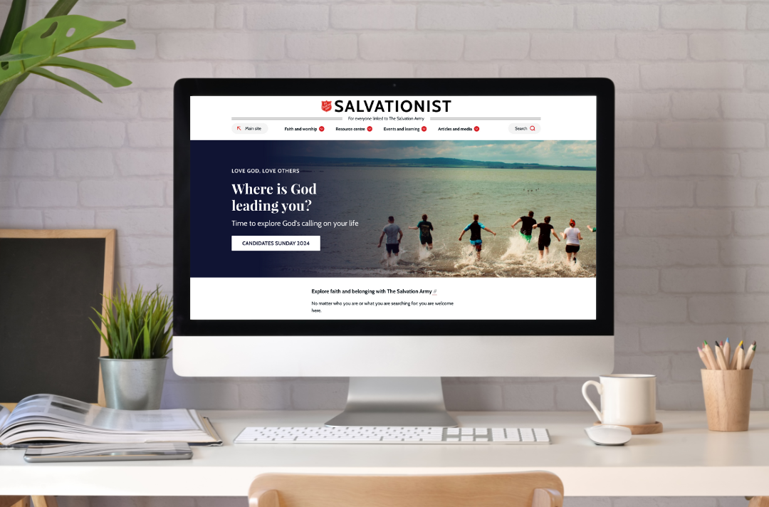 A photo of a computer displaying the Salvationist webpage