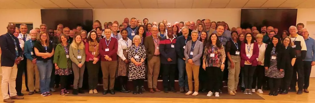 A group photo shows delegates at the All Ecumenical Representatives Conference, September 2024.