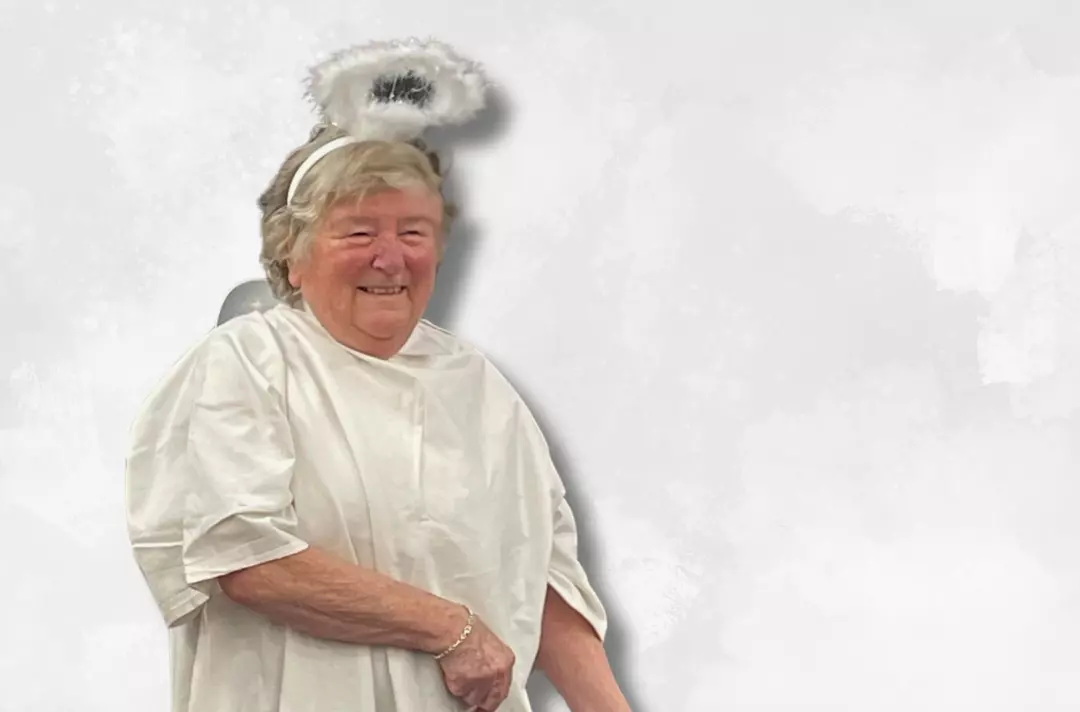A photo shows Janet Elliot.