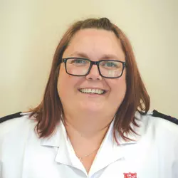 A headshot photo of Emma Scott wearing Salvation Army uniform