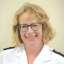 A headshot photo of Julia Attwood wearing Salvation Army uniform