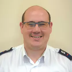 A headshot photo of Johnathan Brown wearing Salvation Army uniform